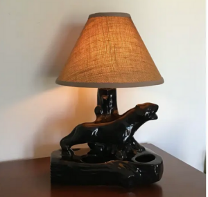 a tv lamp on a brown table 